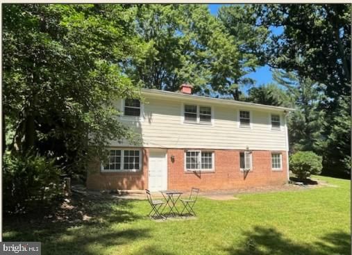 Backyard, Exterior, Facade, Brick Facade, Raised Ranch