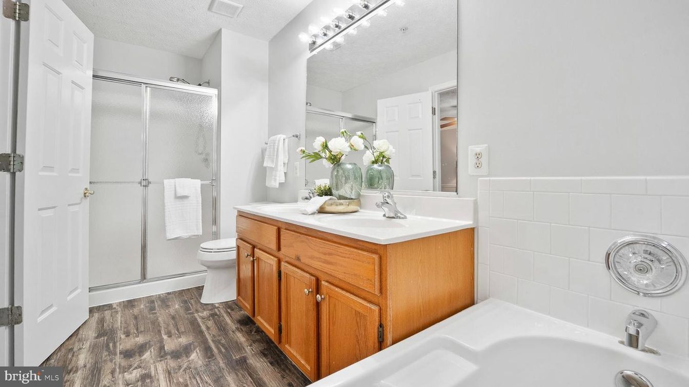 Bathroom, Dual Sink Vanities, Glass Shower, Interior, Wood Texture Flooring