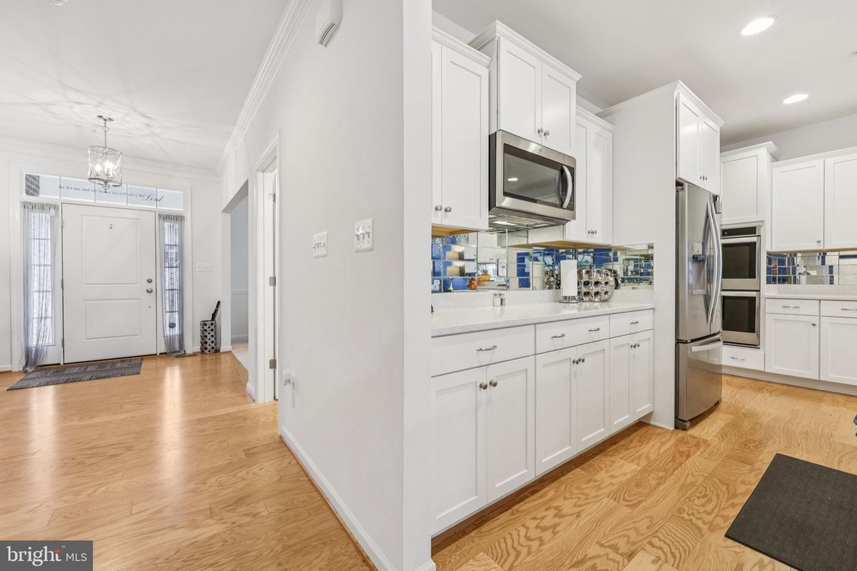 Chandelier, Interior, Kitchen, Recessed Lighting, Stainless Steel Appliances, Wood Texture Flooring