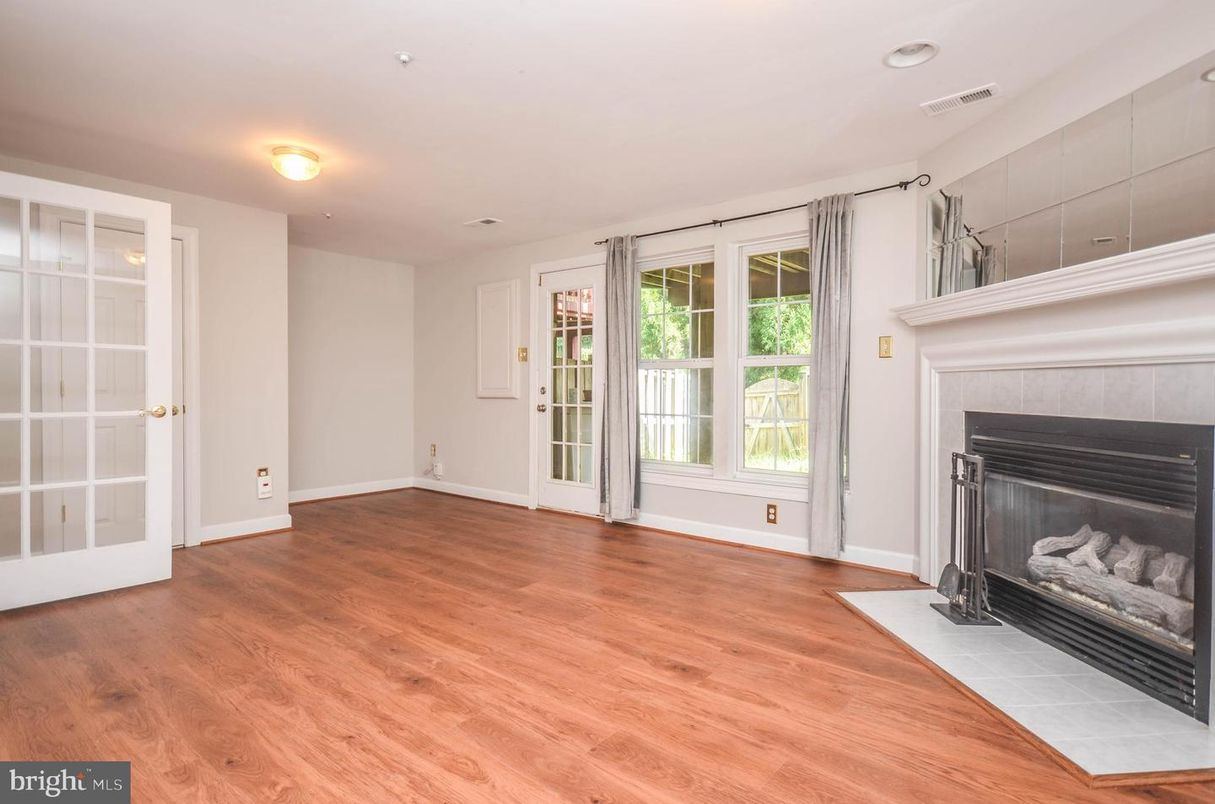 Empty room, Fireplace, Interior, Recessed Lighting, Wood Texture Flooring