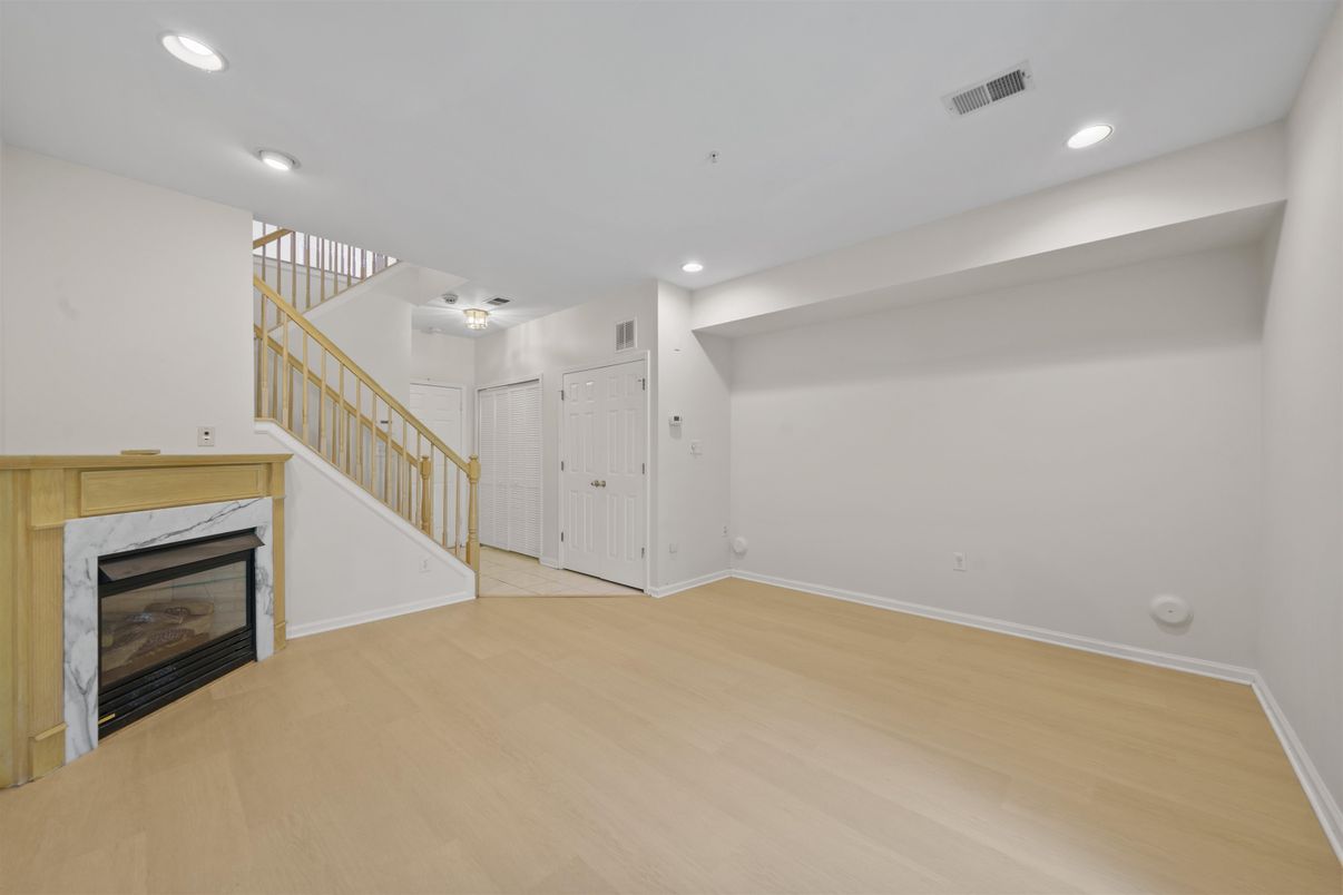 Empty room, Fireplace, Interior, Recessed Lighting, Wood Texture Flooring