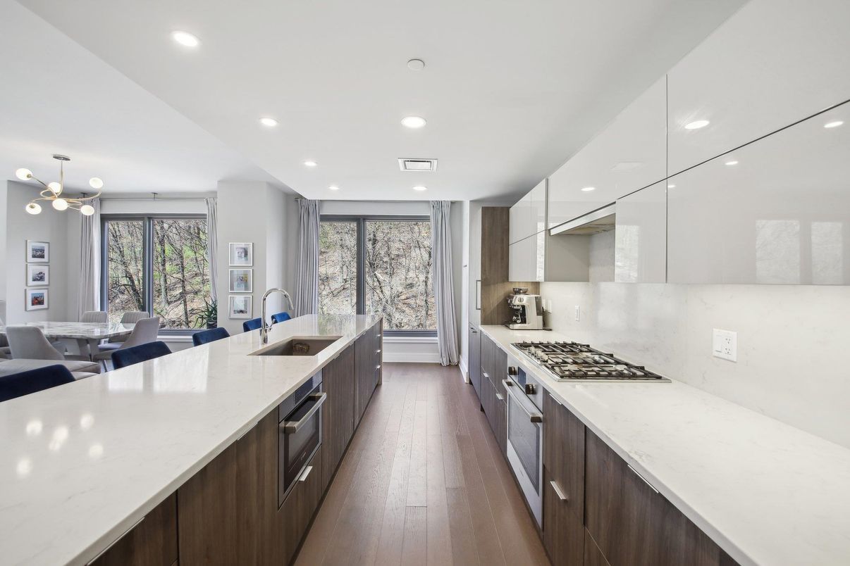 Dining room, Interior, Kitchen, Pendant Lights, Recessed Lighting, Stainless Steel Appliances, Wood Texture Flooring