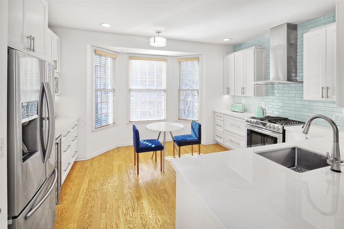 Dining room, Interior, Kitchen, Recessed Lighting, Stainless Steel Appliances, Wood Texture Flooring