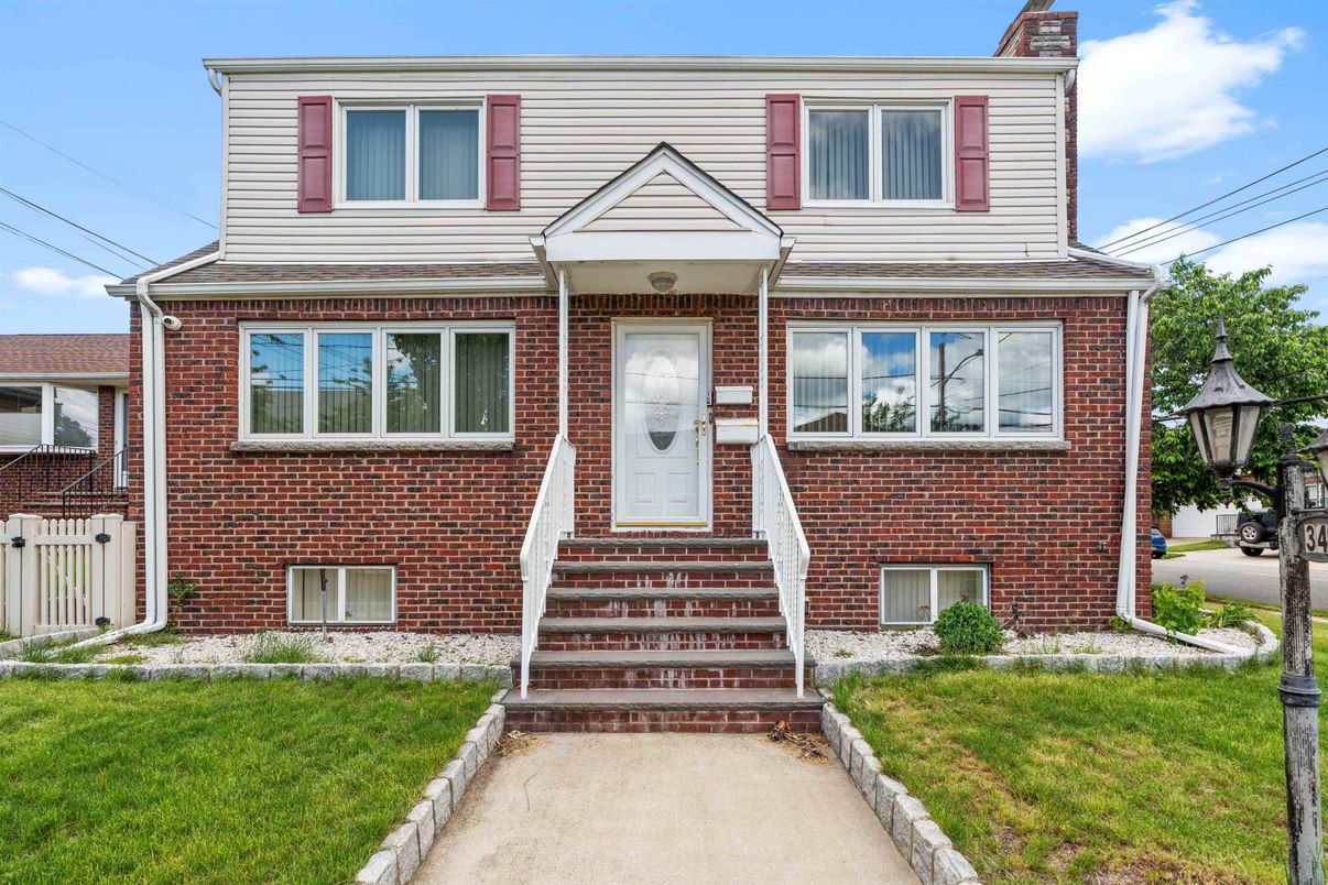 Exterior, Facade, Brick Facade, Raised Ranch