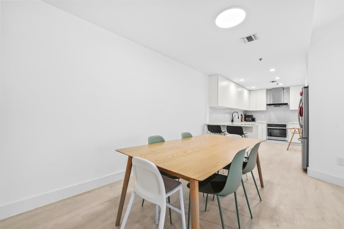 Dining room, Interior, Kitchen, Recessed Lighting, Stainless Steel Appliances, Wood Texture Flooring