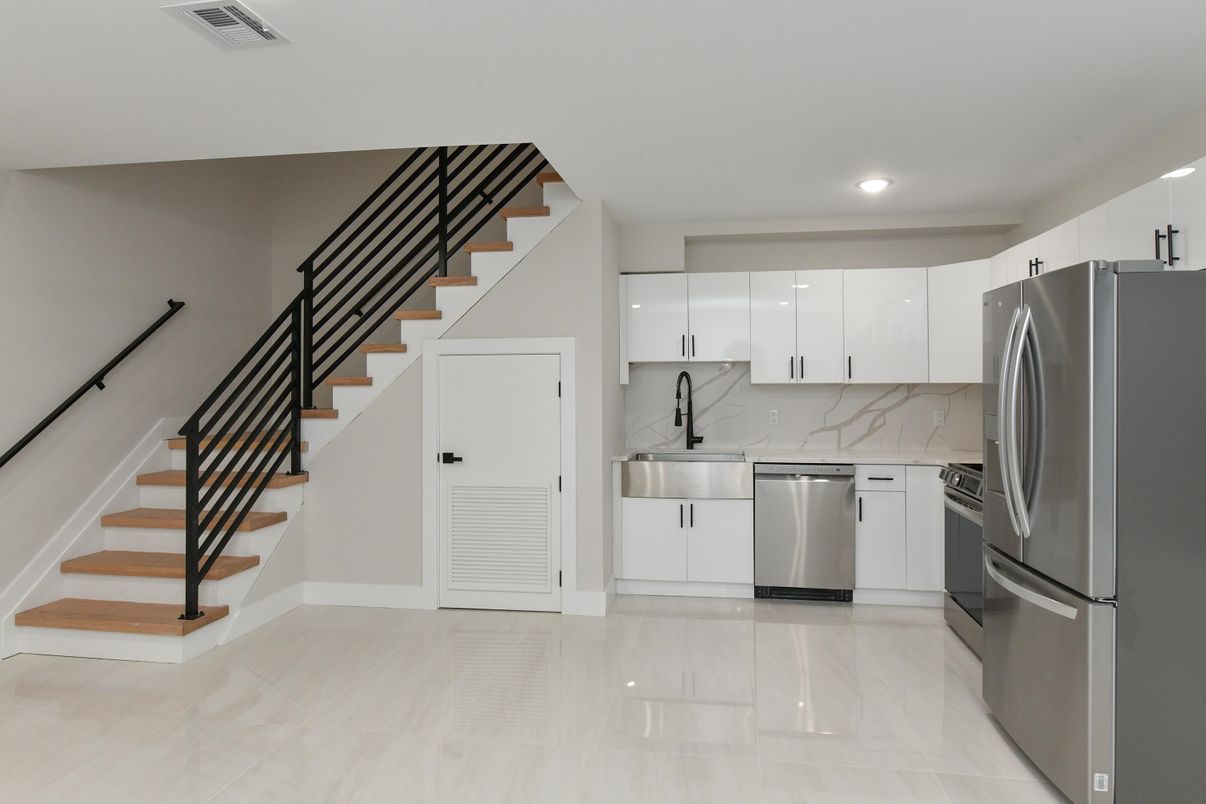 Interior, Kitchen, Marble Walls, Recessed Lighting, Stainless Steel Appliances