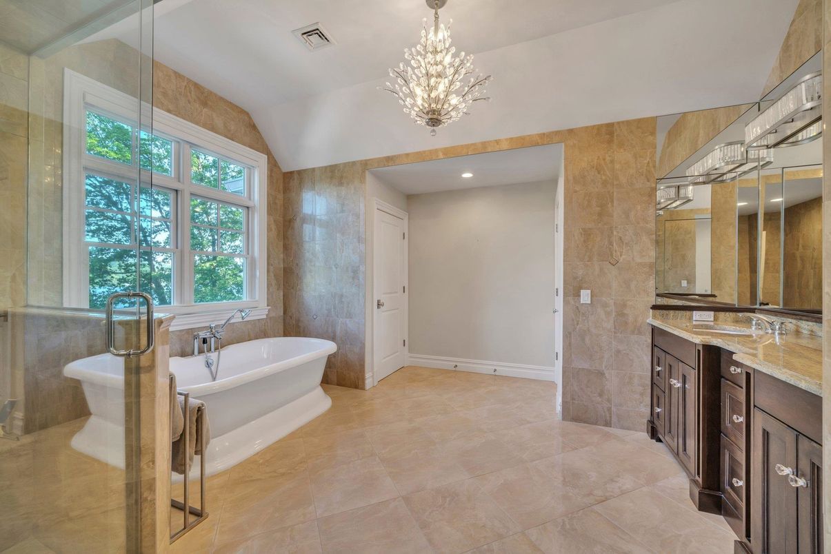 Bathroom, Chandelier, Dual Sink Vanities, Free Standing Baths, Interior, Recessed Lighting