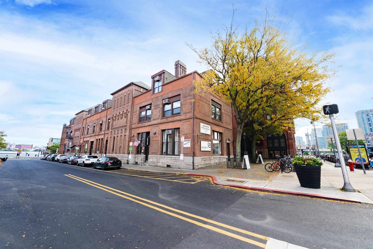 Exterior, Facade, Brick Facade, Condo Building