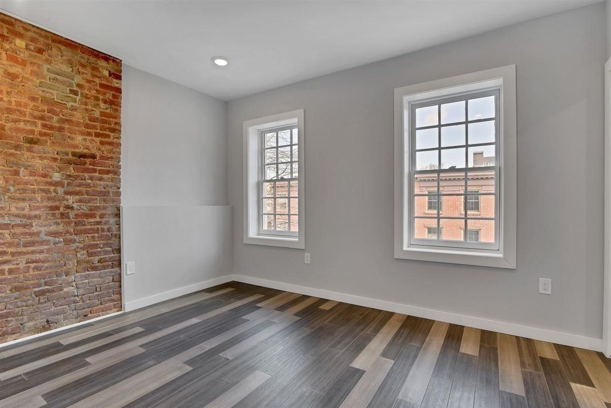 Empty room, Interior, Recessed Lighting, Stone Walls, Wood Texture Flooring