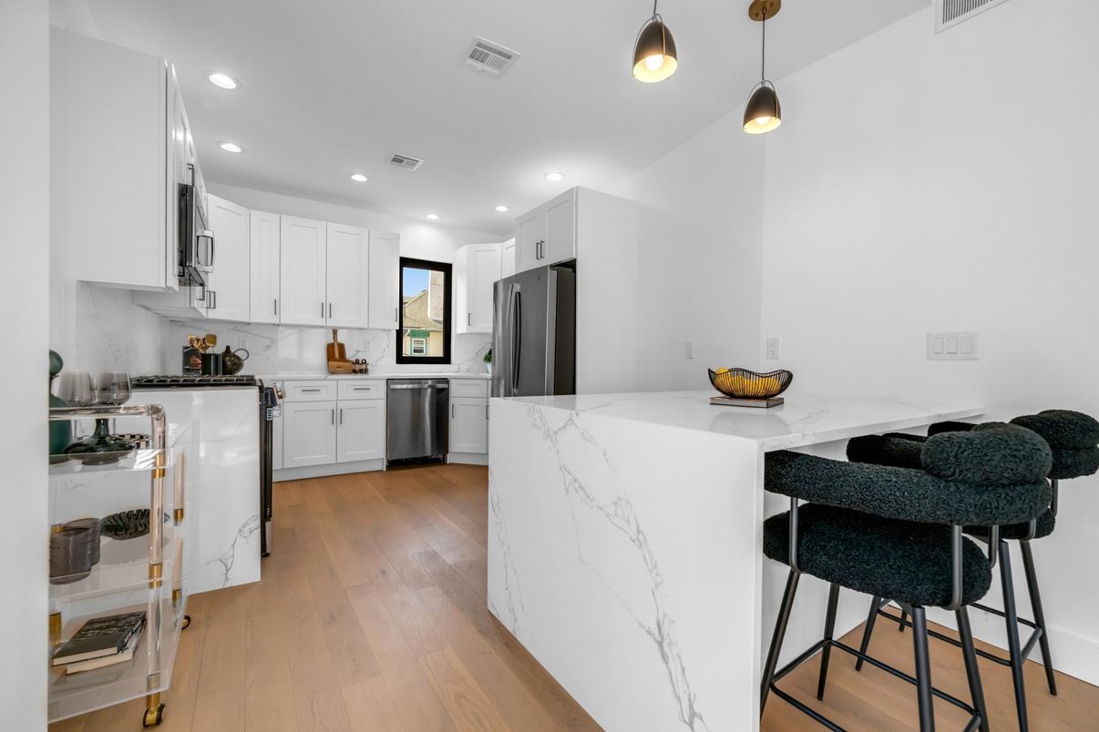 Interior, Kitchen, Pendant Lights, Recessed Lighting, Stainless Steel Appliances, Wood Texture Flooring