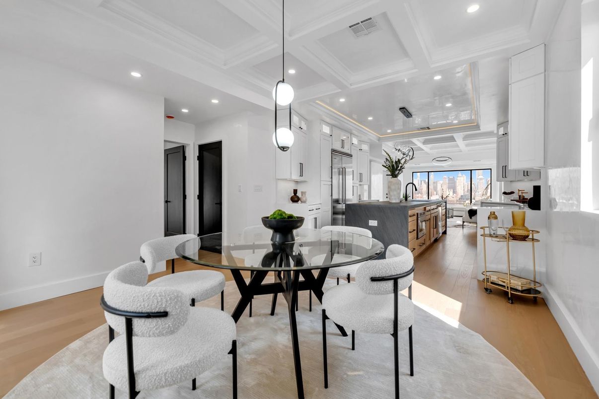 Dining room, Interior, Kitchen, Pendant Lights, Recessed Lighting, Stainless Steel Appliances, Wood Texture Flooring