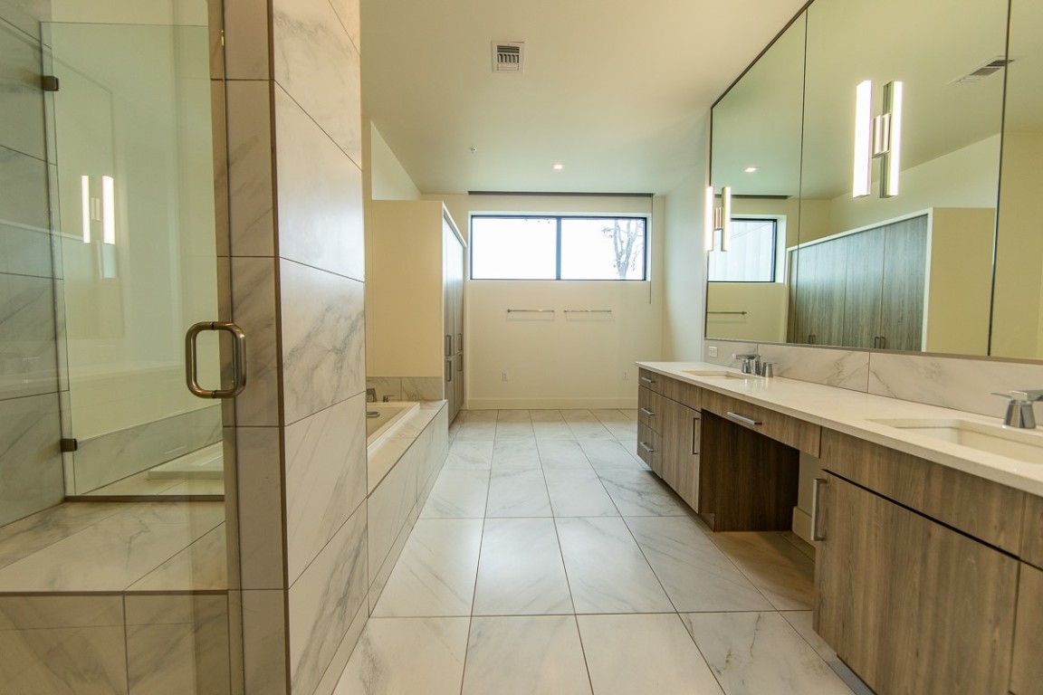 Bathroom, Dual Sink Vanities, Glass Shower, Interior, Marble, Marble Walls, Recessed Lighting