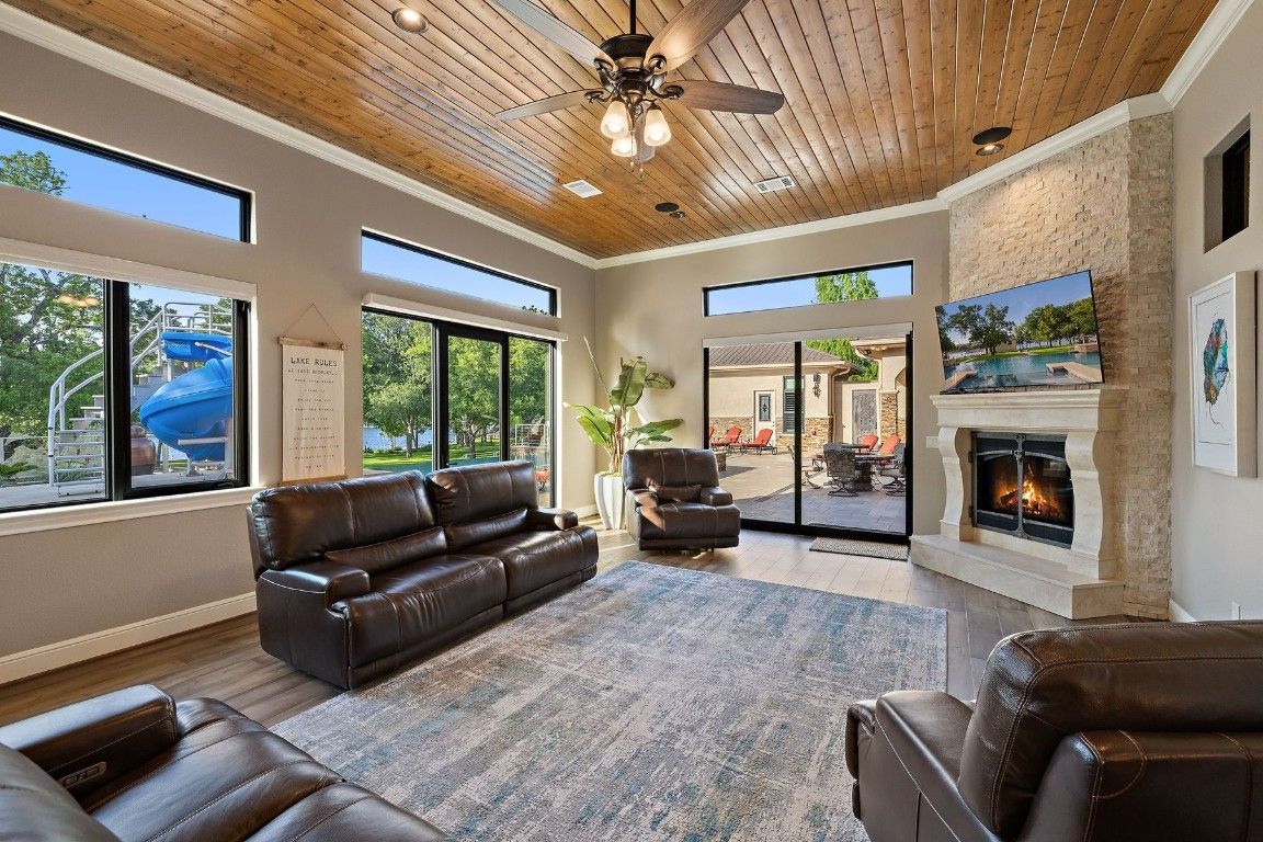 Fireplace, Interior, Living room, Recessed Lighting, Stone Walls, Wooden Ceilings, Wood Texture Flooring