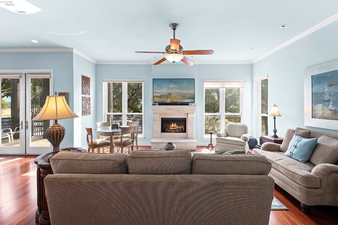 Dining room, Fireplace, Interior, Living room, Recessed Lighting, Wood Texture Flooring