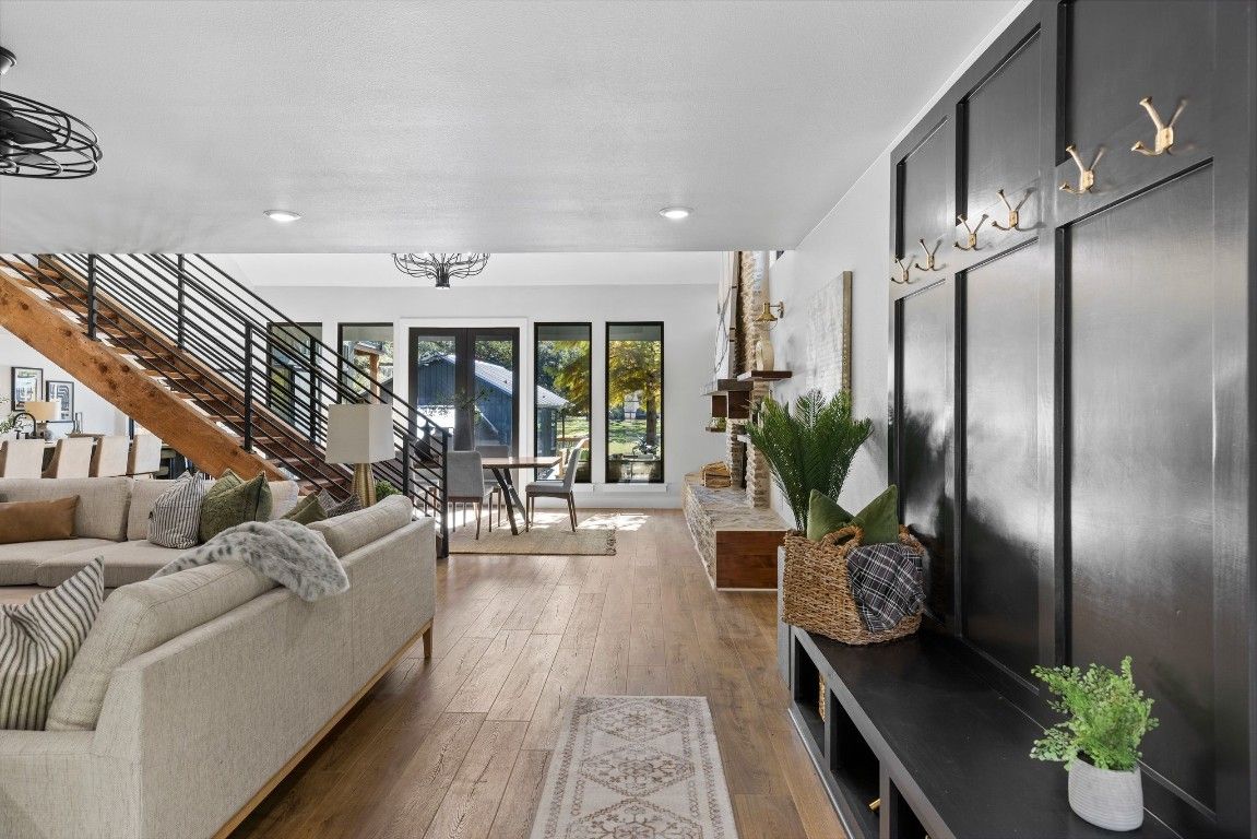 Dining room, Fireplace, Interior, Living room, Recessed Lighting, Wood Texture Flooring