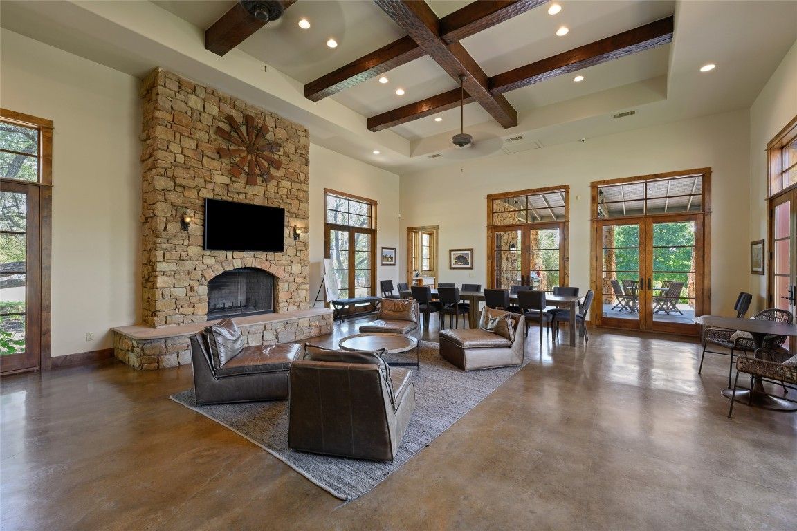 Dining room, Fireplace, Interior, Living room, Recessed Lighting, Stone Walls, Wooden Beams