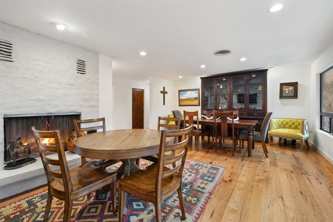 Dining room, Fireplace, Interior, Recessed Lighting, Wood Texture Flooring