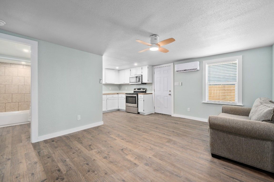 Interior, Kitchen, Living room, Recessed Lighting, Stainless Steel Appliances, Wood Texture Flooring