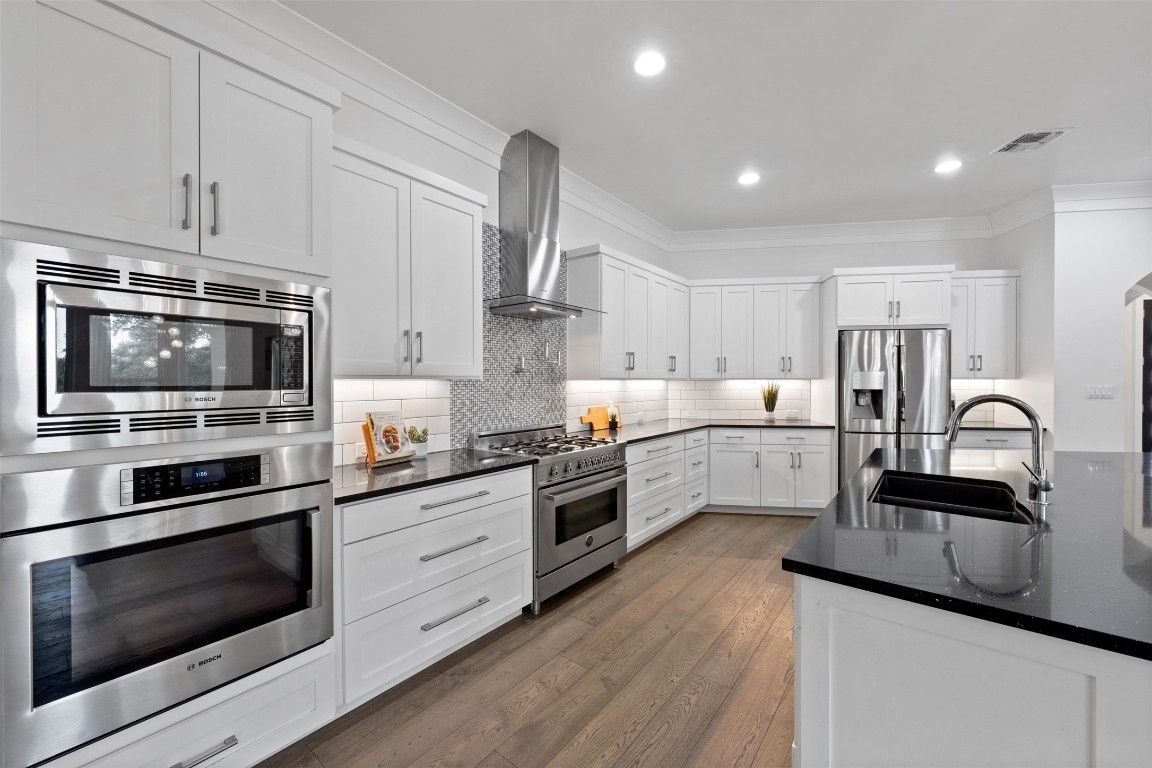 Interior, Kitchen, Recessed Lighting, Stainless Steel Appliances, Wood Texture Flooring