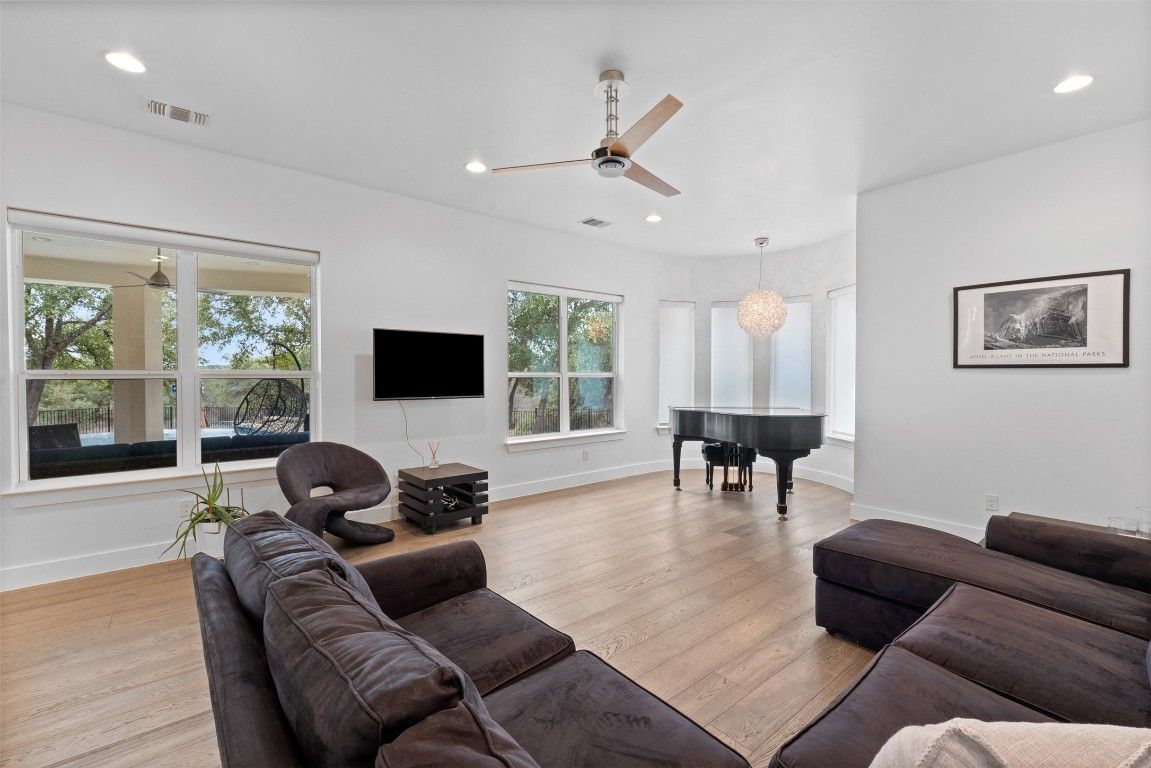Chandelier, Interior, Living room, Piano, Recessed Lighting, Wood Texture Flooring