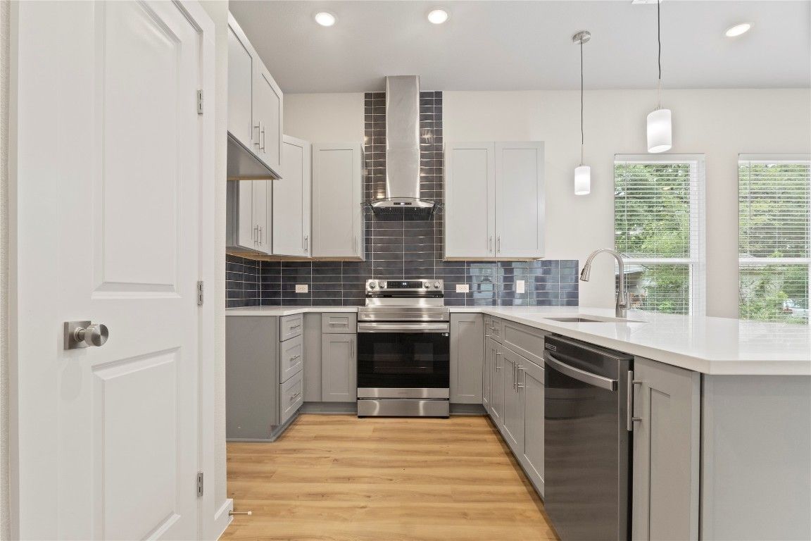 Interior, Kitchen, Pendant Lights, Recessed Lighting, Stainless Steel Appliances, Wood Texture Flooring