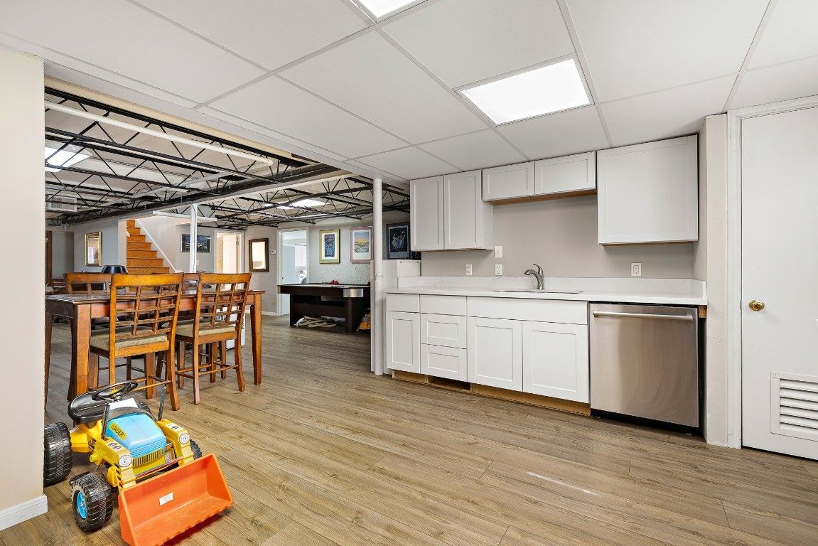 Dining room, Interior, Kitchen, Recessed Lighting, Stainless Steel Appliances, Wood Texture Flooring