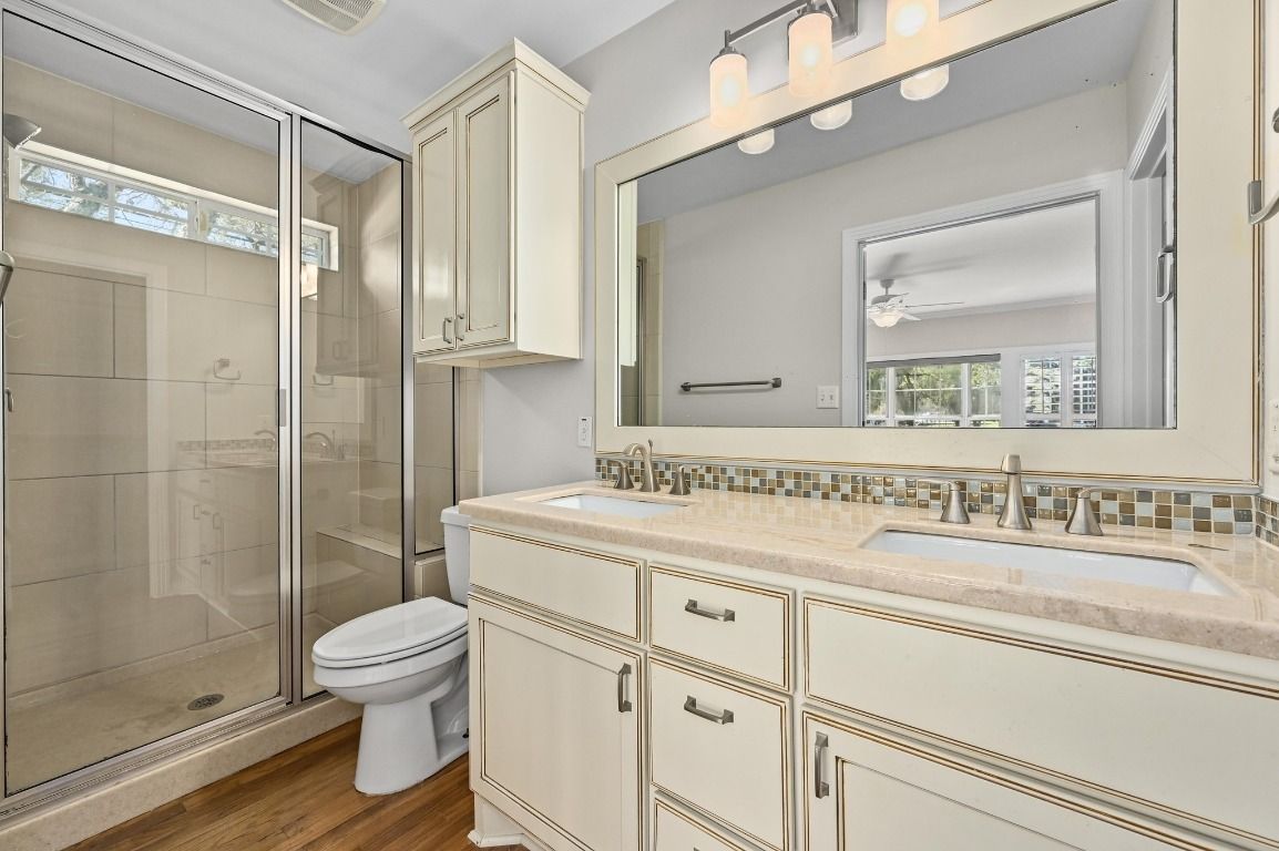 Bathroom, Dual Sink Vanities, Glass Shower, Interior, Wood Texture Flooring