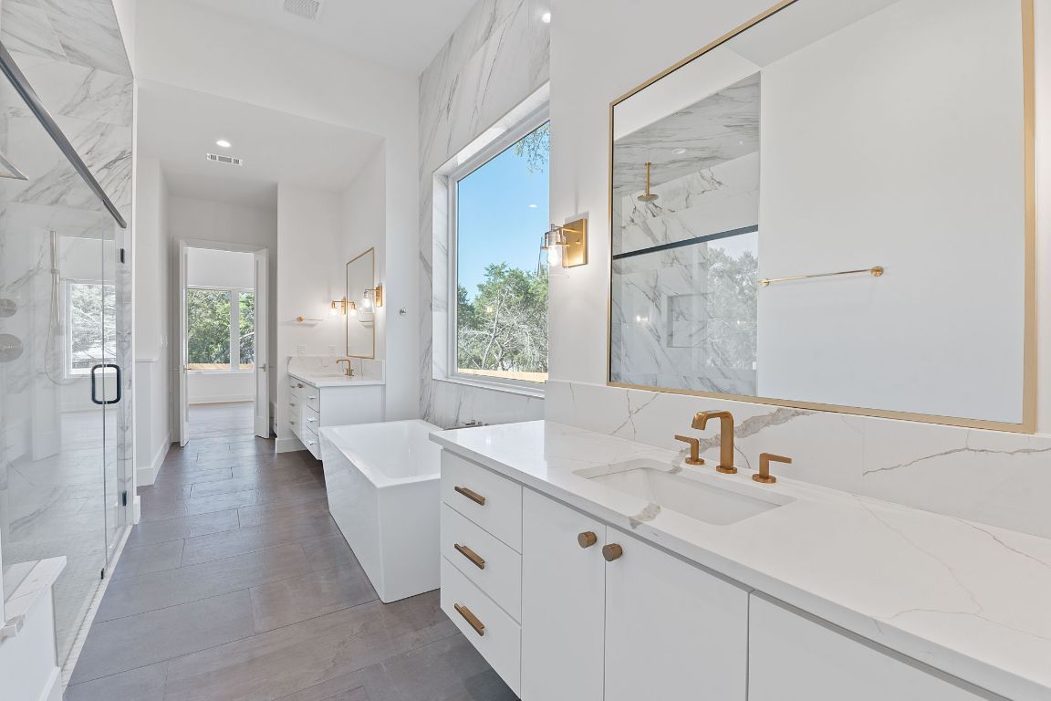 Bathroom, Dual Sink Vanities, Glass Shower, Interior, Marble Walls, Recessed Lighting