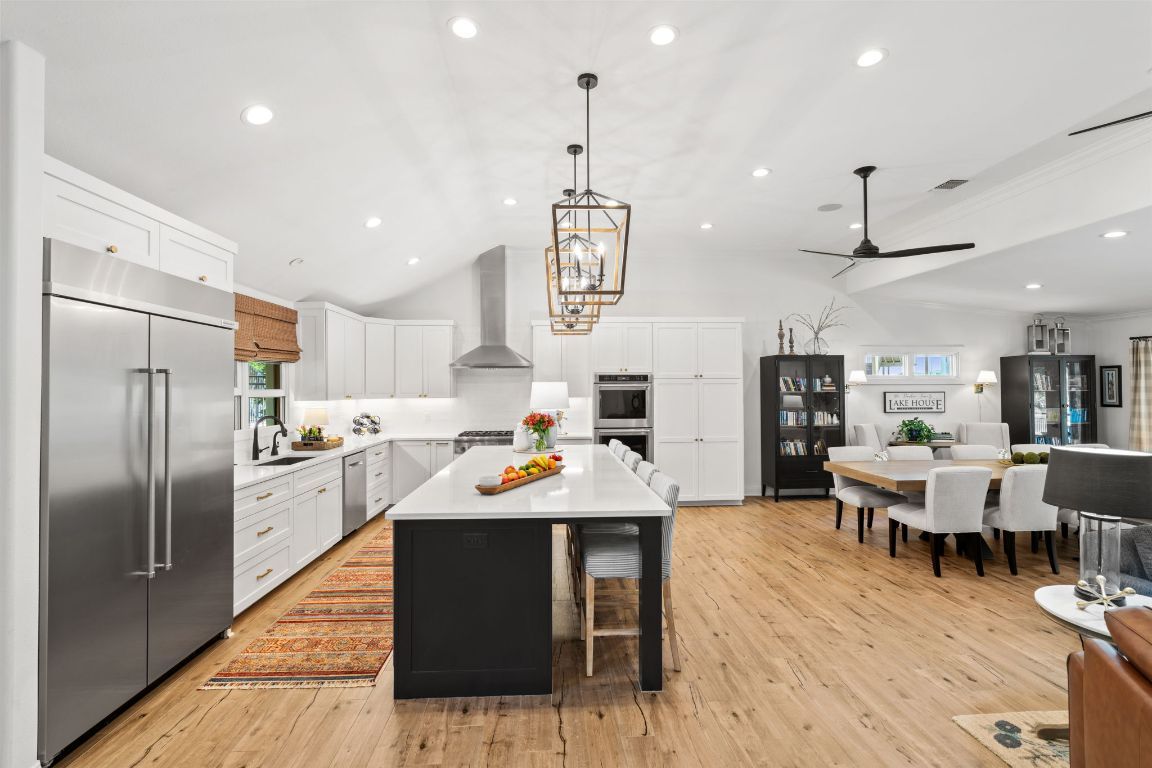 Dining room, Interior, Kitchen, Pendant Lights, Recessed Lighting, Stainless Steel Appliances, Wood Texture Flooring