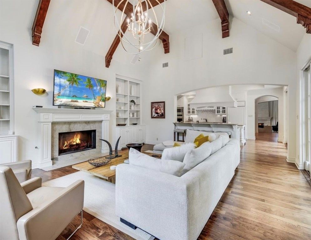 Chandelier, Fireplace, Interior, Living room, Pendant Lights, Recessed Lighting, Wooden Beams, Wood Texture Flooring