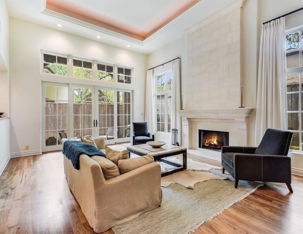 Fireplace, Interior, Living room, Recessed Lighting, Stone Walls, Wood Texture Flooring