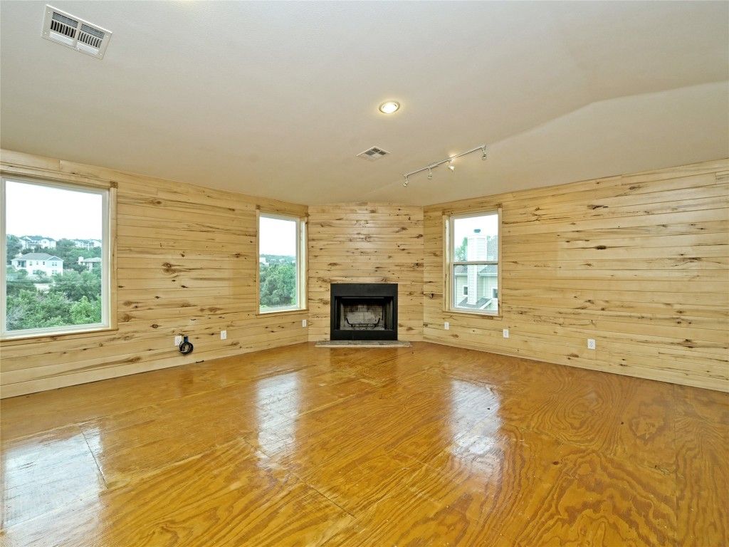 Empty room, Fireplace, Interior, Recessed Lighting, Wood Texture Flooring, Wooden Walls