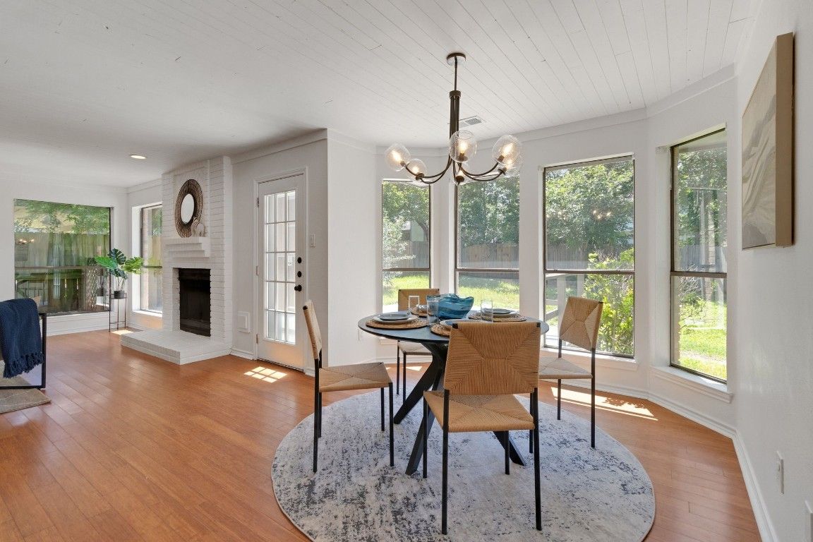 Dining room, Fireplace, Interior, Pendant Lights, Recessed Lighting, Wood Texture Flooring