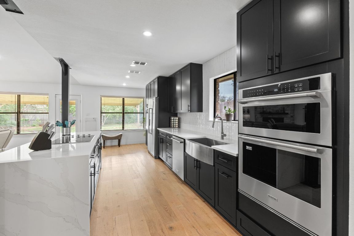 Interior, Kitchen, Recessed Lighting, Stainless Steel Appliances, Wood Texture Flooring
