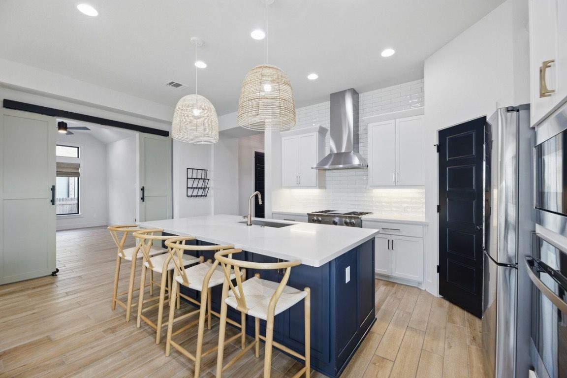 Interior, Kitchen, Pendant Lights, Recessed Lighting, Stainless Steel Appliances, Wood Texture Flooring