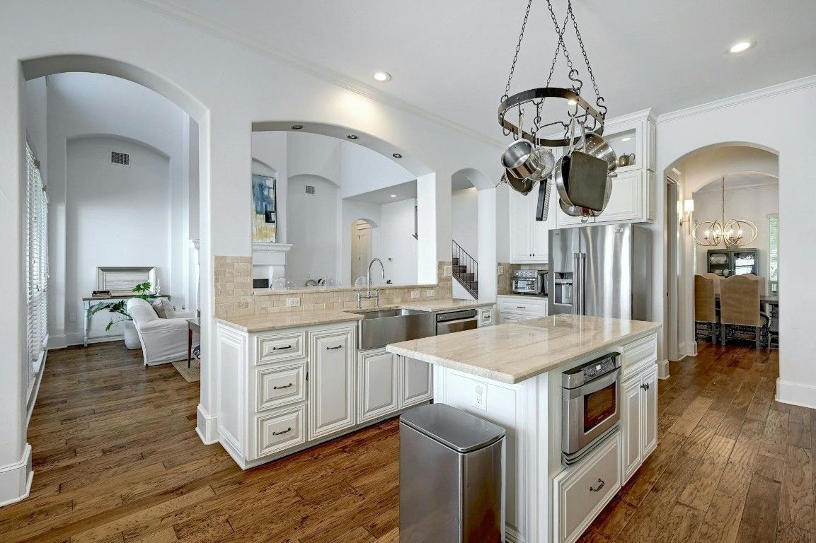 Chandelier, Interior, Kitchen, Pendant Lights, Recessed Lighting, Stainless Steel Appliances, Wood Texture Flooring