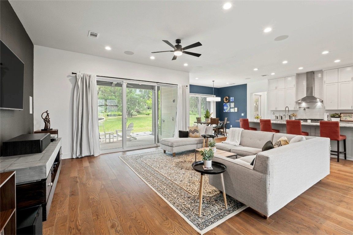 Dining room, Interior, Kitchen, Living room, Pendant Lights, Recessed Lighting, Stainless Steel Appliances, Wood Texture Flooring