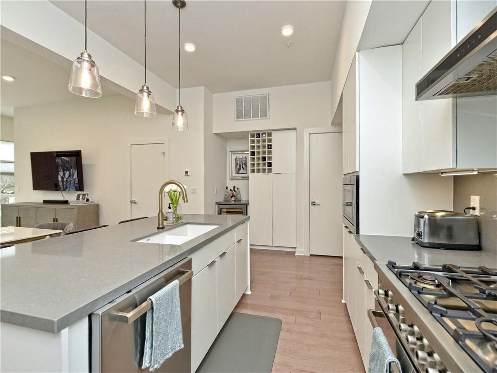 Interior, Kitchen, Pendant Lights, Recessed Lighting, Stainless Steel Appliances, Wood Texture Flooring