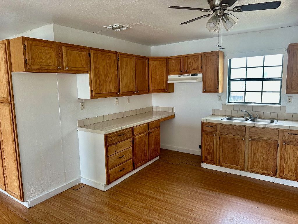 Interior, Kitchen, Tile Countertops, Wood Texture Flooring