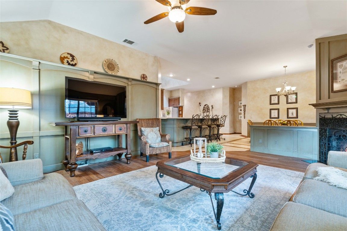 Chandelier, Fireplace, Interior, Living room, Recessed Lighting, Wood Texture Flooring