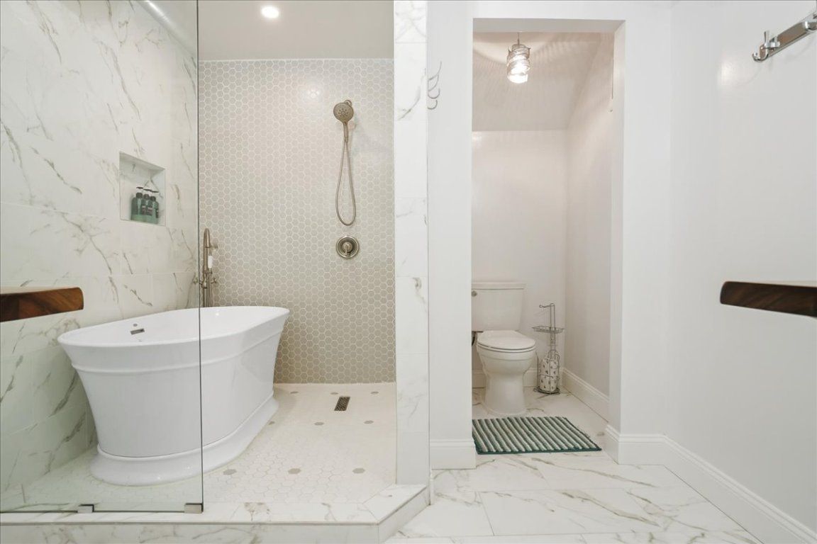 Bathroom, Free Standing Baths, Glass Shower, Interior, Marble, Marble Walls, Recessed Lighting