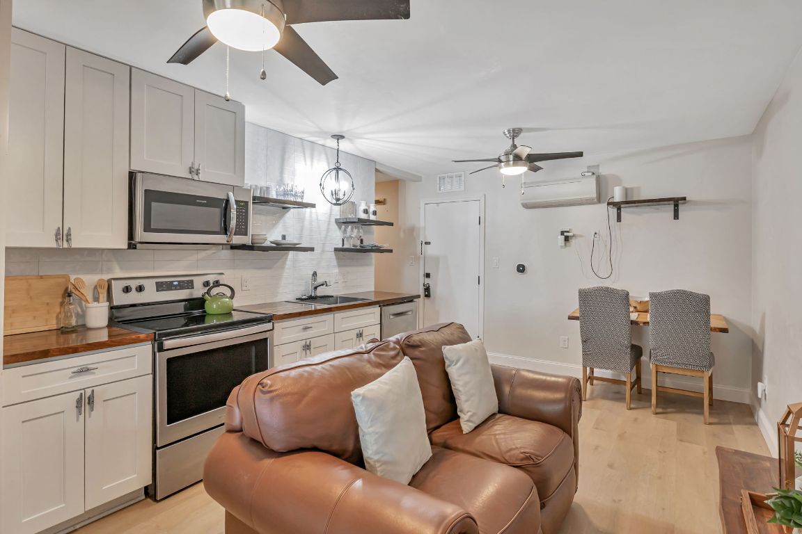 Dining room, Interior, Kitchen, Living room, Stainless Steel Appliances, Wood Texture Flooring