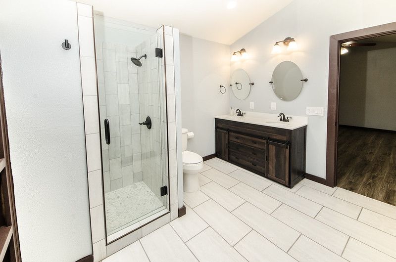 Bathroom, Dual Sink Vanities, Glass Shower, Interior, Wood Texture Flooring