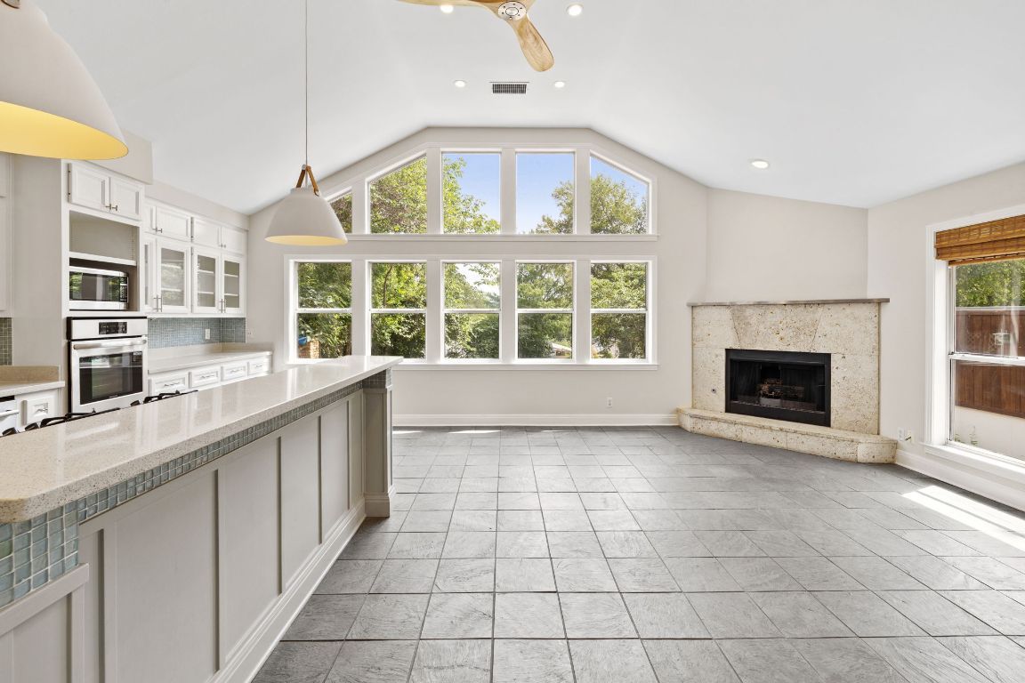 Fireplace, Interior, Kitchen, Pendant Lights, Recessed Lighting, Stainless Steel Appliances
