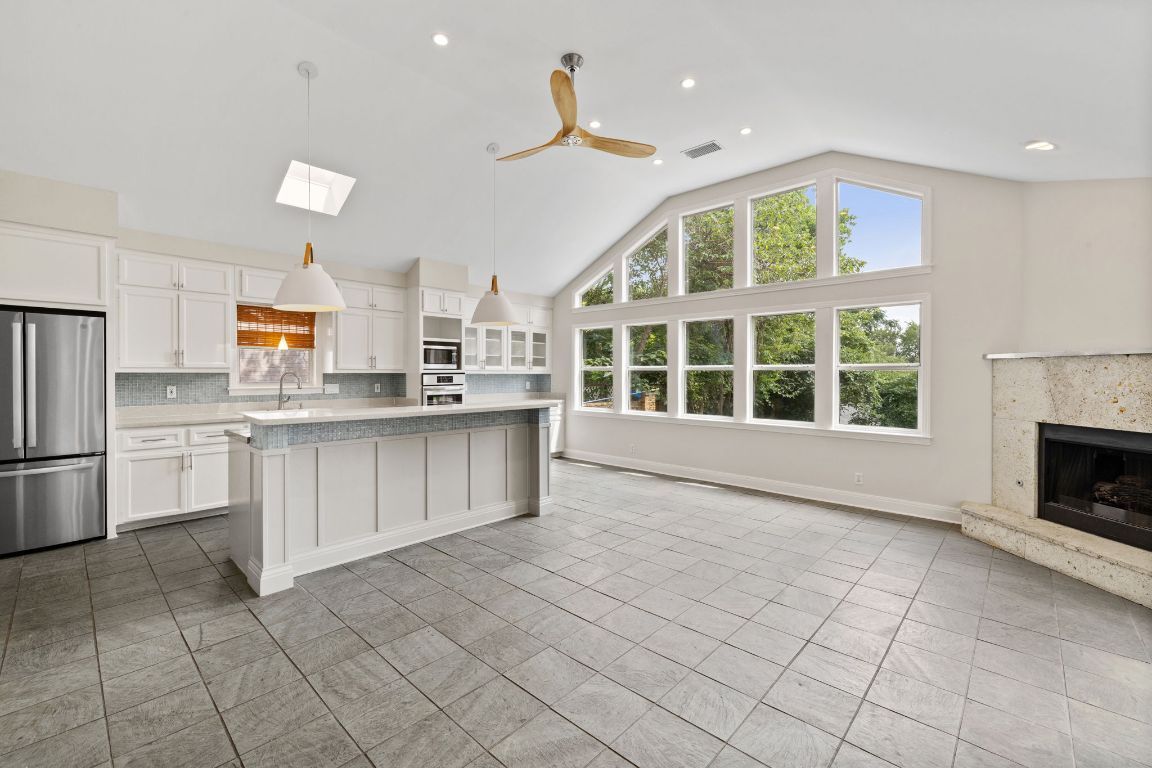 Fireplace, Interior, Kitchen, Pendant Lights, Recessed Lighting, Stainless Steel Appliances