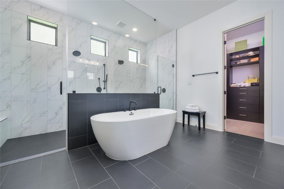 Bathroom, Dual Sink Vanities, Free Standing Baths, Glass Shower, Interior, Marble Walls, Recessed Lighting