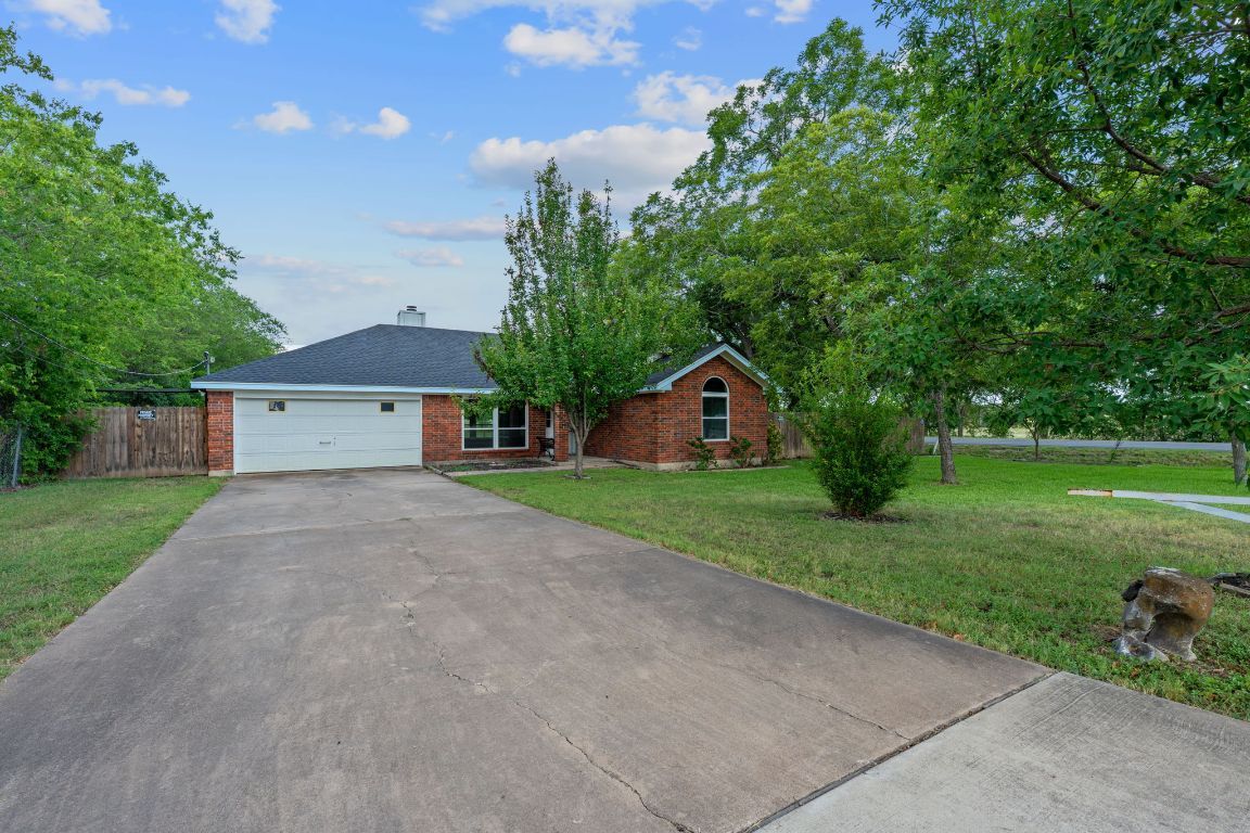 Attached, Backyard, Exterior, Facade, Brick Facade, Ranch