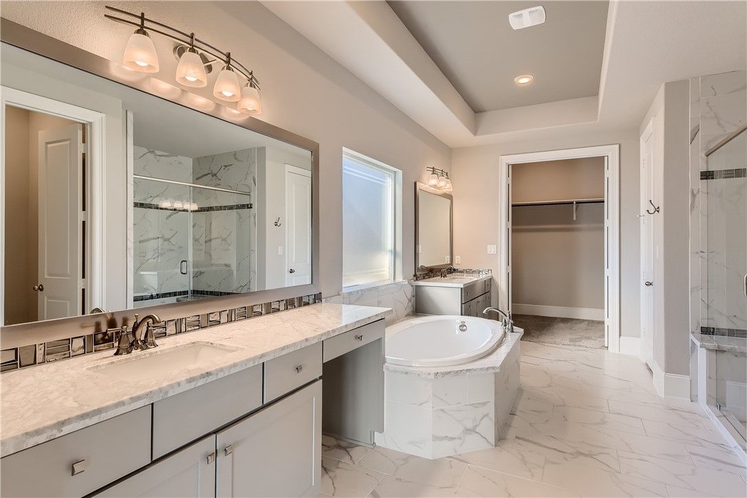 Bathroom, Dual Sink Vanities, Interior, Marble, Marble Walls, Recessed Lighting
