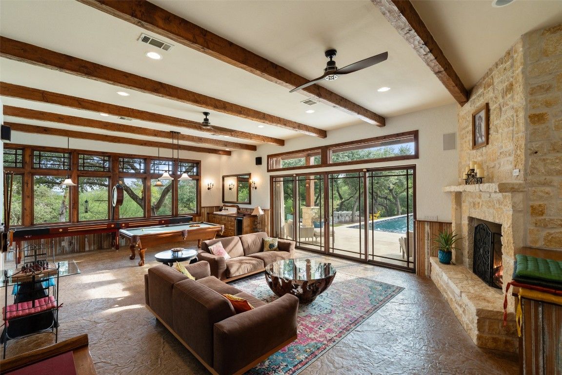 Billiard Table, Fireplace, Game Room, Interior, Living room, Pendant Lights, Recessed Lighting, Stone Walls, Wooden Beams