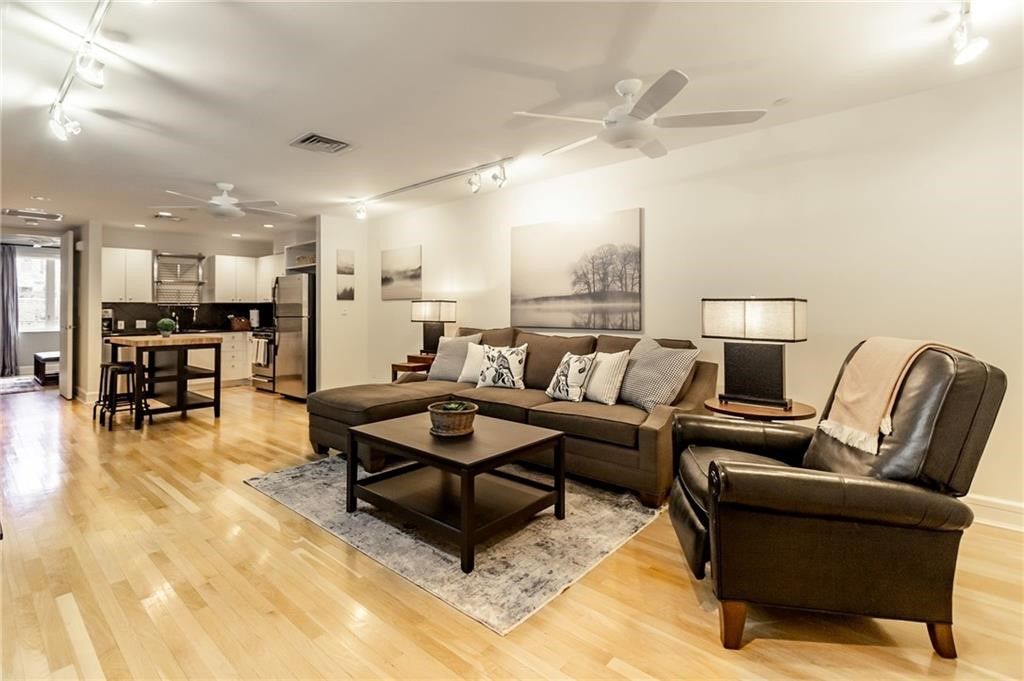 Dining room, Interior, Kitchen, Living room, Recessed Lighting, Stainless Steel Appliances, Wood Texture Flooring